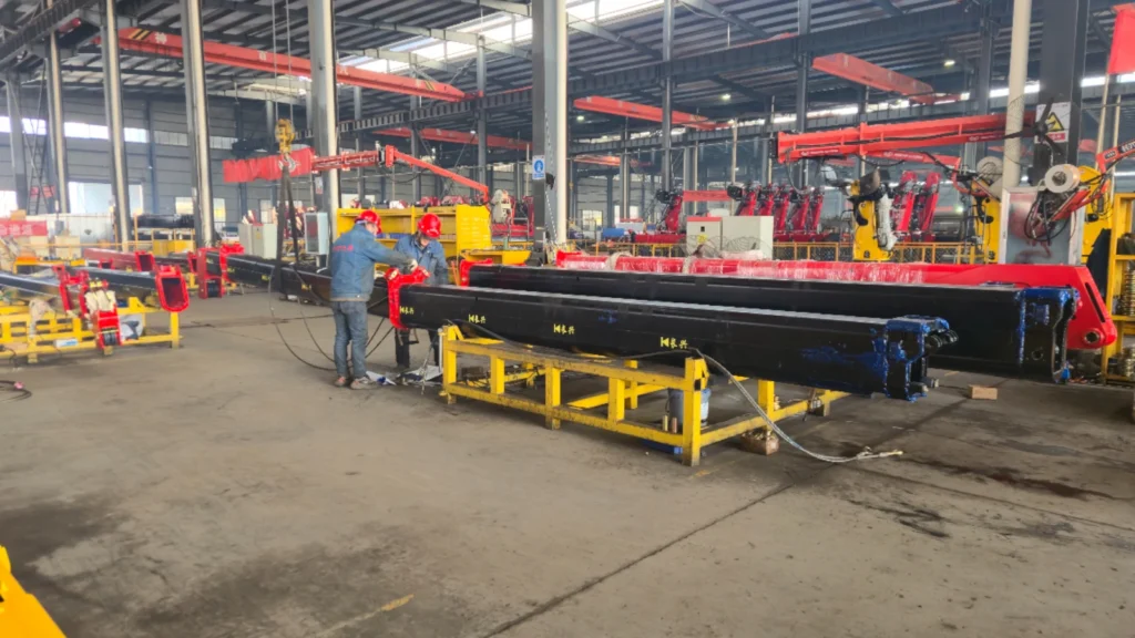 Straight boom truck-mounted crane in production at the factory